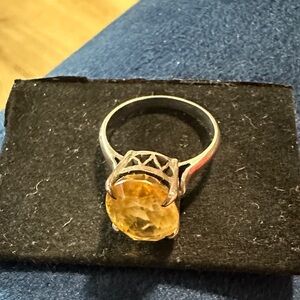 Elegant Silver Ring with Yellow Gemstone